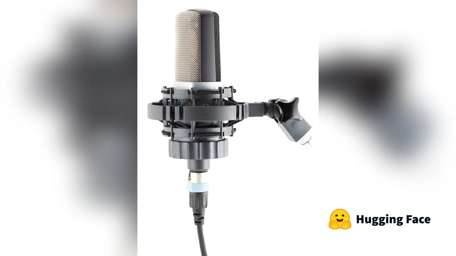 A studio condenser microphone, with the Hugging Face logo