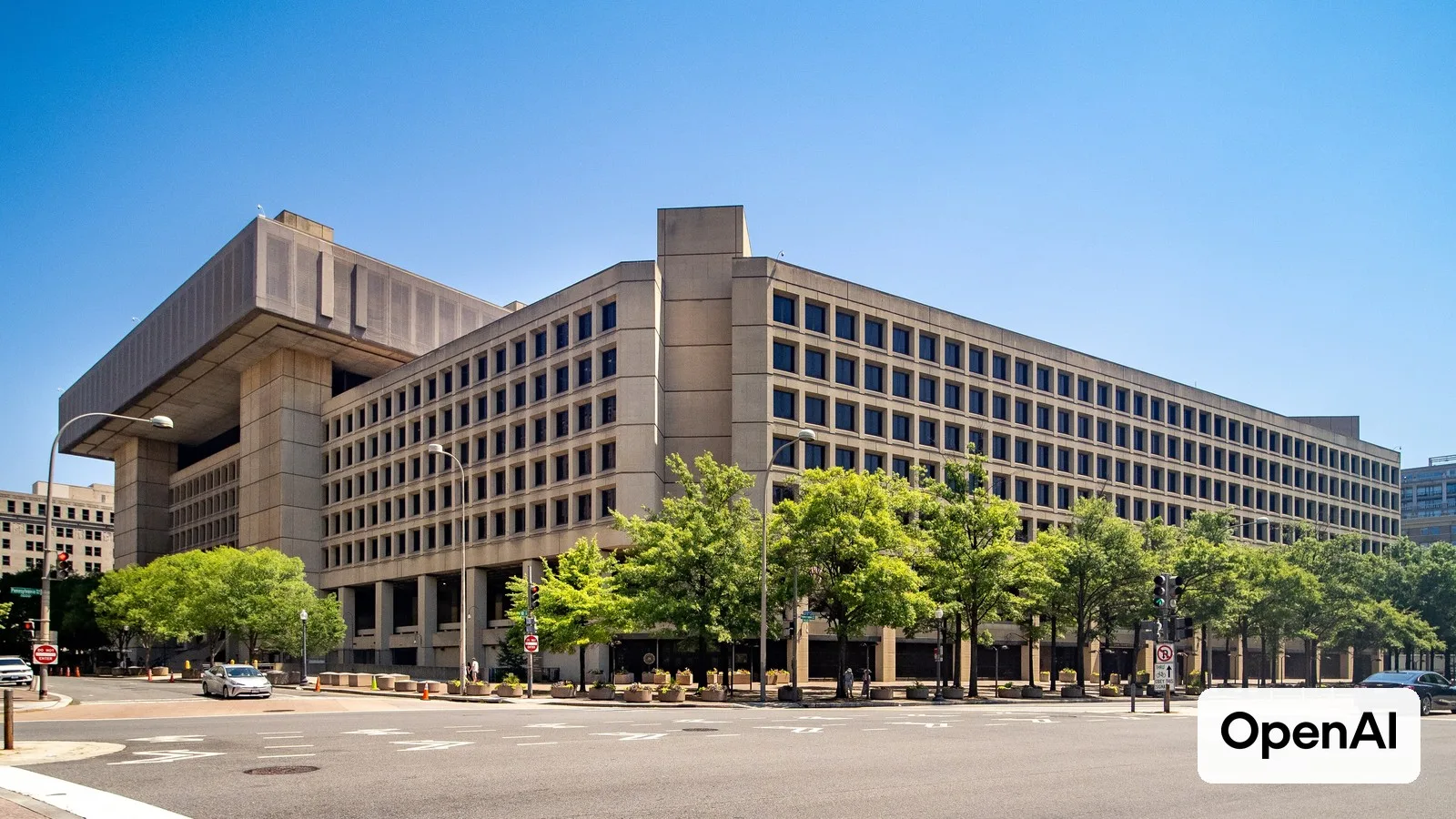 The FBI's J. Edgar Hoover Building headquarters in Washington, D.C., with the OpenAI logo