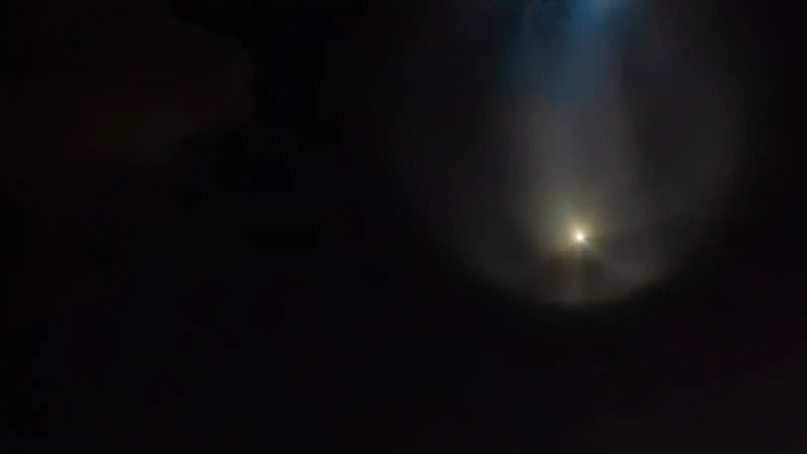 A Falcon 9 rocket launching the CRS-35 cargo mission from Cape Canaveral Space Force Station at dawn